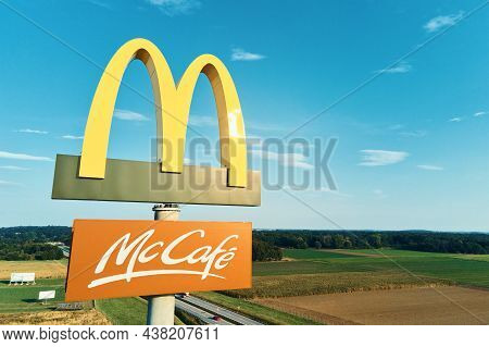 Mcdonalds Restaurant Logo, Aerial View. Mccafe Sign. Katy Wroclawskie, Poland - October 2, 2021