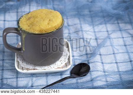 Vanilla Mugcake Is Microwaved. Homemade Cupcake In A Coffee Mug.