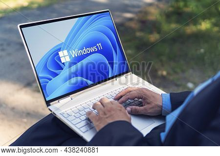 June 23, 2021. Barnaul, Russia. Windows 11 Logo On The Screens Of A Transformer Laptop. A New Operat
