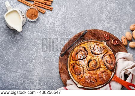 Cinnabon Cinnamon Rolls Buns With Pumpkin, Nut, Caramel And Sugar Cream Iced. Top View. Sweet Homema