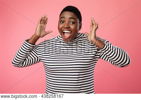 Excited Overweight Black Female Shouting In Excitement Over Pink Background