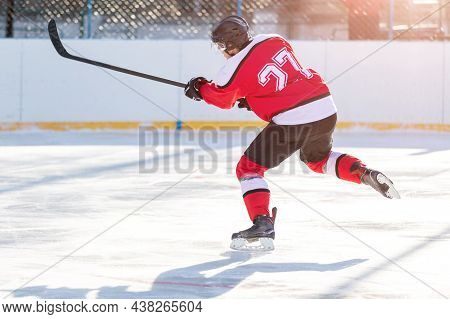 Professional Ice Hockey Player In Attack On The Rink