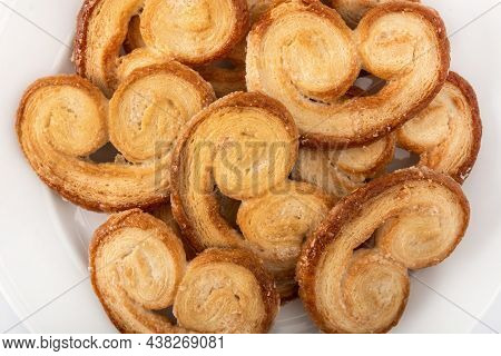 Palmier Puff Pastry In Plate Isolated On White Background