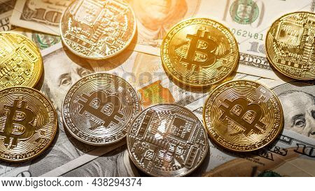 Golden Bitcoin Lies On The Banknotes.new Virtual Money. Crypto Currency Top View. Real Coins Of Bitc