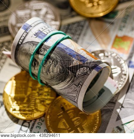 Golden Bitcoin Lies On The Banknotes.new Virtual Money. Crypto Currency Top View. Real Coins Of Bitc