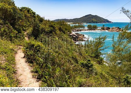Trail With Cliffs Vegetation,  Waves And Rocks