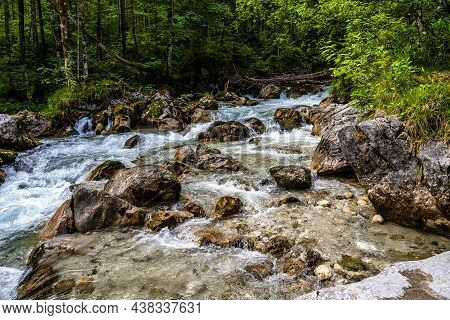 Magic Forest Zauberwald At Lake Hintersee With Creek Ramsauer Ache. National Park Berchtesgadener La