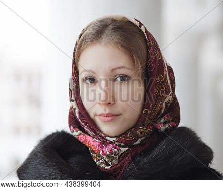 Portrait Of Young Beautiful Woman In Russian Folk Patterned Shawl, Outdoor.
Traditional Headscarf. R