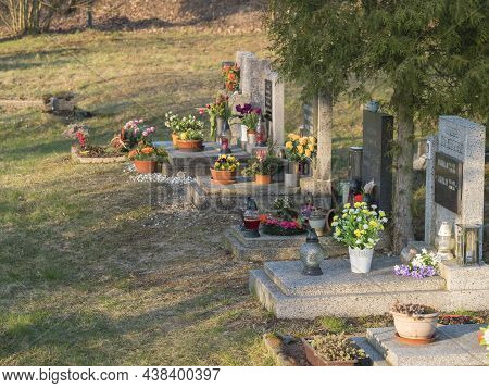 Hermanice V Podjestedi, Czech Republic, April 4, 2021: Stone Graves At Country Cemetery At Small Vil