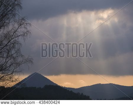 Overcast Sky Before Sunset With Sun Rays At Forest Landscape With Hill Klic, Kleis. Sunlight Shining