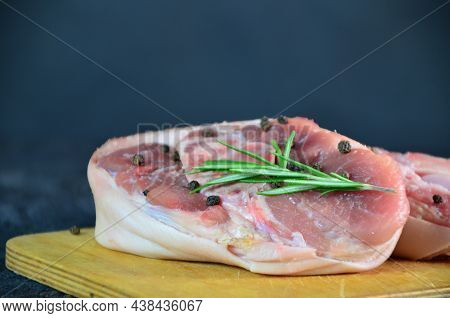 Pieces Of Raw Pork Steaks, With Ingredients For Cooking, Served On Woodenboard. Concept Of Food Prep
