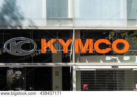 Madrid, Spain - September 26, 2021: Kymco Store. Kwang Yang Motor Company Sign
