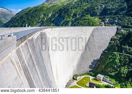 Huge Concrete Apline Dam On Sunny Summer Day. Zillergrundl Speicher, Zillertal Alps, Austria