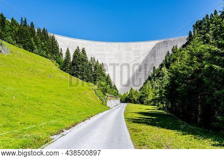 Huge Concrete Apline Dam On Sunny Summer Day. Zillergrundl Speicher, Zillertal Alps, Austria