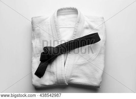 Martial Arts Uniform With Black Belt On White Background, Top View