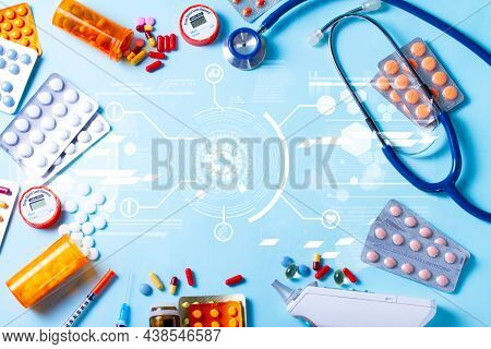 Modern Healthcare And Technologycal Renovations Concept - Pills And Medical Instruments On Blue Back