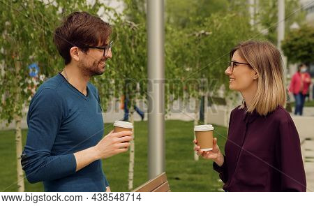 Smiling Caucasian Businesswoman And Man Funny Coversation Talking. Coworkers Friendly Discussion Dur