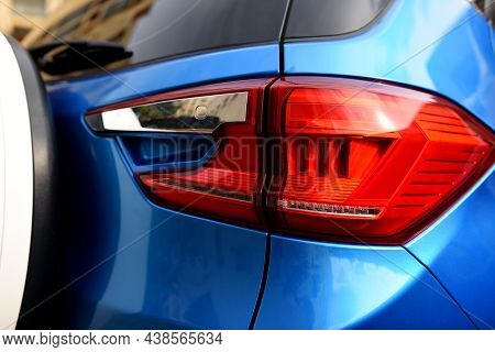 Rear Led Headlamp Of A Modern Car. Brake Taillight. Red Stop Lighting Of Highway Vehicles. Cars Ambi