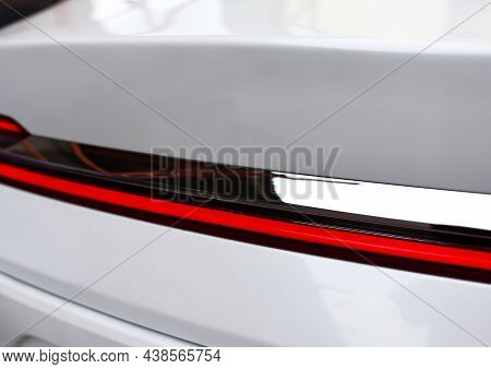 Rear Led Headlamp Of A Modern Car. Brake Taillight. Red Stop Lighting Of Highway Vehicles. Cars Ambi