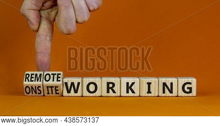 Onsite Or Remote Working Symbol. Businessman Turns Cubes And Changes Words 'remote Working' To 'onsi