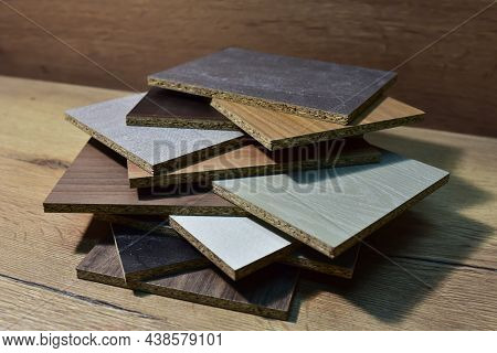 Samples Of Fibreboard Panels With Wood Texture. Laminated Cpd. Chipboard Pvc Edge. Wooden Furniture
