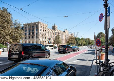 Munich, Germany - September 15, 2018: 
Traditional German City Street With Old Houses Facades, Cafes
