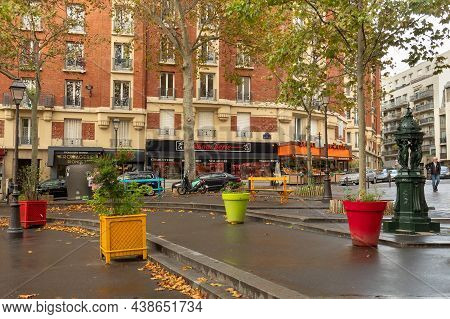 Paris, France - November 5th 2019: Colorful Tree Pots At Place Edith-piaf