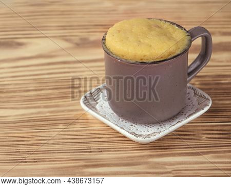 Vanilla Mugcake Is Microwaved. Homemade Cupcake In A Coffee Mug.
