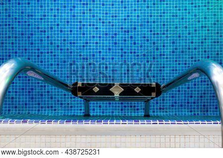 Handrail On Pool. Swimming Pool With Stair At The Fitness Centre. A Swimming Pool Water, The Clear B