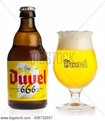 Groningen, Netherlands - October 31, 2021: Bottle And Glass Of Belgian Duvel 666 Blonde Beer Isolate
