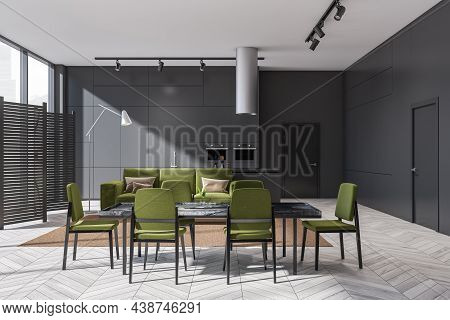 Dining Room Interior With Green Sofa, Table And Grey Kitchen On Background. Minimalist Concept. Mode