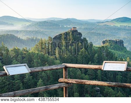 Tourist View Platform With Engraved Map On Vilemina Rock. Popular View Point Above Forest Landscape 