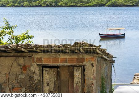 Houses Made Of Clay And Cement On The Banks Of The Grand Paraguacu River.