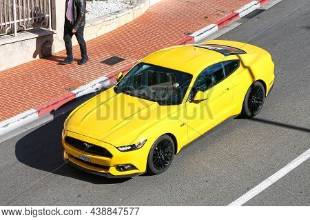 Monte-carlo, Monaco - March 12, 2019: Yellow Muscle Car Ford Mustang S550 In A City Street.