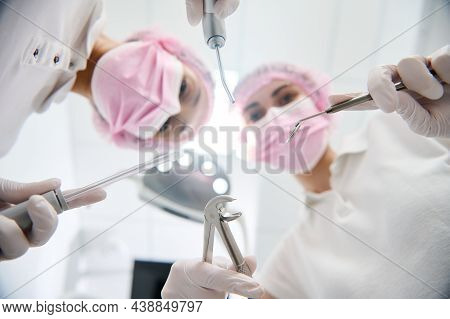 Focus On Stainless Steel Dental Instruments- Extractor Forceps And Probe, Saliva Ejector And Irrigat