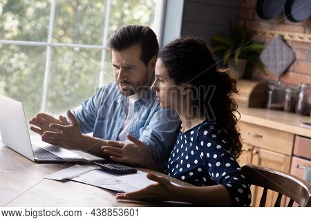Worried Married Couple Do Financial Paperwork Discuss Debt Overdue Bill