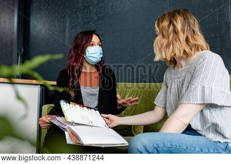 Beautician giving a beauty consultation
