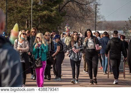 Belgrade, Serbia - March 27, 2021: Selective Blur On Two Women, Friends, Serbs, Eating Popcorn In Th