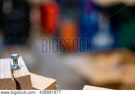 Selective Focus On Cracked And Split Wood From Not Drilling A Pilot Hole Before Driving A Screw