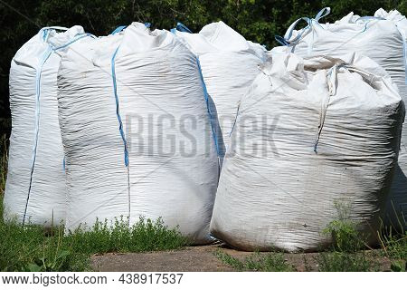 Garbage Collection In Nature. Garbage Bags. Environmental Care. High Quality Photo