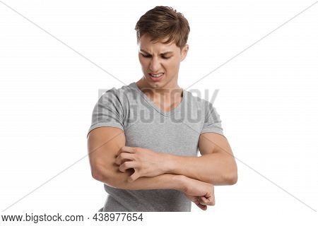 Despaired Sad Millennial Caucasian Male Itching And Suffering From Allergies, Isolated On White Back