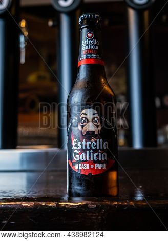Extremadura, 11.05, 2021. Bottle Of Estrella Galicia Pale Lager Draft Beer On Black. Estrella Galici