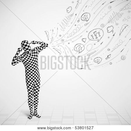 Funny guy in body suit morphsuit looking at sketches and doodles