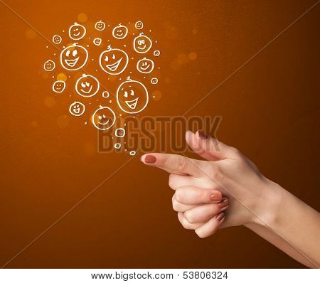 Group of happy hand drawed smiley faces coming out of gun shaped hands