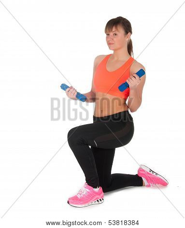 Fitness Woman Exercising With Dumpbells