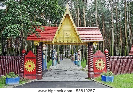 Entrance To The Park With Wooden Sculptures Of Knights