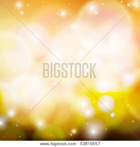 Shining vector abstract bokeh in gold.