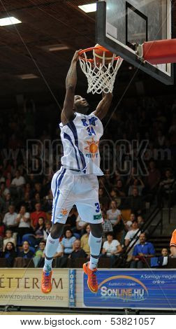 KAPOSVAR, HUNGARY ÃÂ¢Ã?Ã? OCTOBER 26: Wayne Chism (in white) in action at a Hungarian Championship basketball game with Kaposvar (white) vs. Fehervar (blue) on October 26, 2013 in Kaposvar, Hungary.