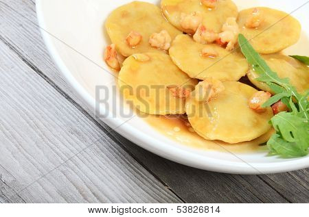House ravioli the filled fillets dorado with sauce from shrimps