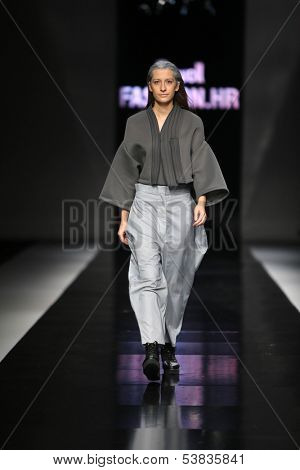 ZAGREB, CROATIA - OCTOBER 17: Fashion model wearing clothes designed by Petra Vuletic and Sasa Hortig on the 'Fashion.hr' show on October 17, 2013 in Zagreb, Croatia.